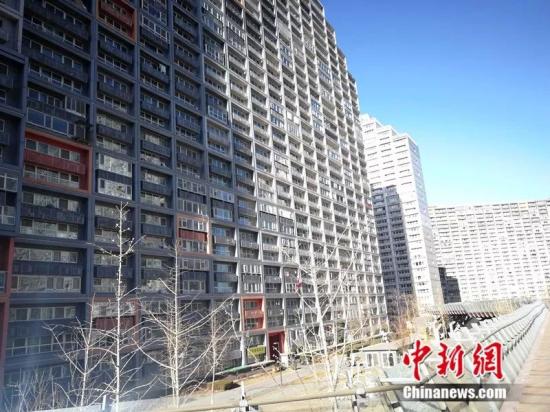 2018年12月，北京像素小区，楼房窗户密密麻麻。<a target='_blank' href='http://www.chinanews.com/' >中新网记者邱宇摄